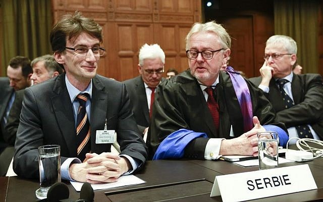 William Schabas, right, and members of a Serbian delegation at the International Court of Justice in The Hague, Netherlands in March. Schabas heads a UN Human Rights Commission inquiry into war crimes during the 2014 Gaza conflict (photo credit: AP/Jiri Buller) William Schabas, right, and members of a Serbian delegation at the International Court of Justice in The Hague, Netherlands in March. Schabas heads a UN Human Rights Commission inquiry into war crimes during the 2014 Gaza conflict (photo credit: AP/Jiri Buller)