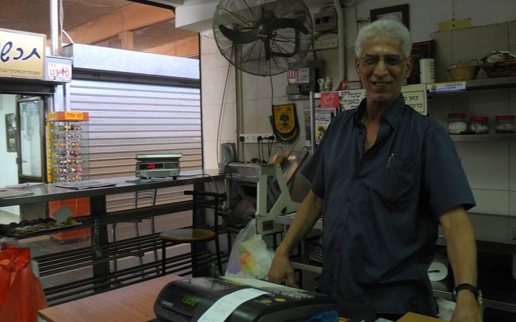 Sian Avner, owner of Sian's Bakery in Sderot, was one of the few shops open in the shuk in Sderot on Wednesday, August 27. Though the ceasefire held, residents were shaken and angry.  (photo credit: Melanie Lidman/Times of Israel)
