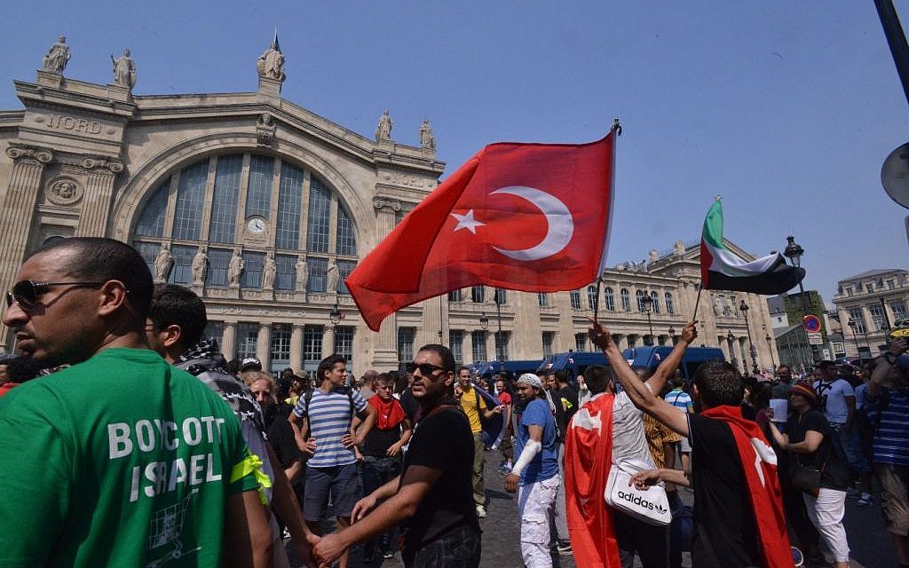 Protesters at an unauthorized anti-Israel rally in front of Paris’ Gare du Nord train station, July 19, 2014. (photo credit: Cnaan Liphshiz/JTA) Protesters at an unauthorized anti-Israel rally in front of Paris’ Gare du Nord train station, July 19, 2014. (photo credit: Cnaan Liphshiz/JTA)