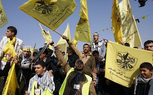 Palestinians take part in a rally marking the 48th anniversary of the founding of Fatah in Gaza, January 4, 2013 [photo credit: Abed Rahim Khatib/Flash90) Palestinians take part in a rally marking the 48th anniversary of the founding of Fatah in Gaza, January 4, 2013 [photo credit: Abed Rahim Khatib/Flash90)