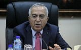 Former Palestinian prime minister Salam Fayyad, seen here when still in office, heads a cabinet meeting in the West Bank city of Ramallah, April 16, 2013. (Issam Rimawi/Flash90)
