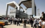 Illustrative photo of Palestinians waiting at the Rafah border crossing between Egypt and the southern Gaza Strip on June 17, 2014 (photo credit: Abed Rahim Khatib/Flash90)