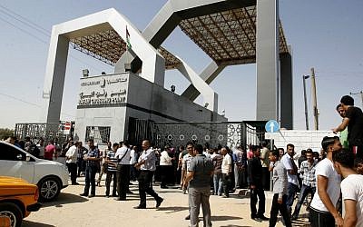 Illustrative photo of Palestinians waiting at the Rafah border crossing between Egypt and the southern Gaza Strip on June 17, 2014 (photo credit: Abed Rahim Khatib/Flash90)