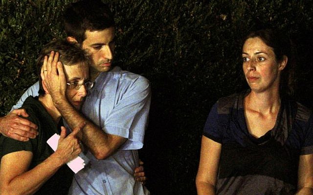 Mother Lea and brother Haim (L) of Israeli soldier Hadar Goldin are seen during a news conference outside their home in the central Israeli city of Kfar Saba August 2, 2014. (photo by Flash90)