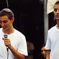 Hadar Goldin (left), and his twin brother Tzur in an undated photo. Hadar was killed in combat on August 1, 2014, and his body abducted, when serving as a Givati officer during the war in Gaza (Courtesy)