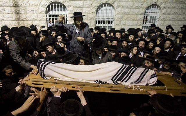 The August 5 funeral for Avraham Waltz, killed in a terror attack in Jerusalem on August 4, in the capital's Mea Shearim neighborhood. (photo credit: Yonatan Sindel/Flash90)
