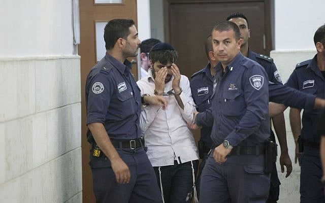 Police escort Yosef Haim Ben-David, one of the Jewish suspects of the murder of Muhammad Abu Khdeir, in the Disctrict Court in Jerusalem, Wednesday, August 6, 2014 (photo credit: Yonatan Sindel/Flash90) Police escort Yosef Haim Ben-David, one of the Jewish suspects of the murder of Muhammad Abu Khdeir, in the Disctrict Court in Jerusalem, Wednesday, August 6, 2014 (photo credit: Yonatan Sindel/Flash90)