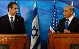 Prime Minister Benjamin Netanyahu (R) holds a joint press conference with New York Governor Andrew Mark Cuomo, at Netanyahu's office in Jerusalem, Wednesday, August 13, 2014. (photo credit: Haim Zach/GPO/Flash90)