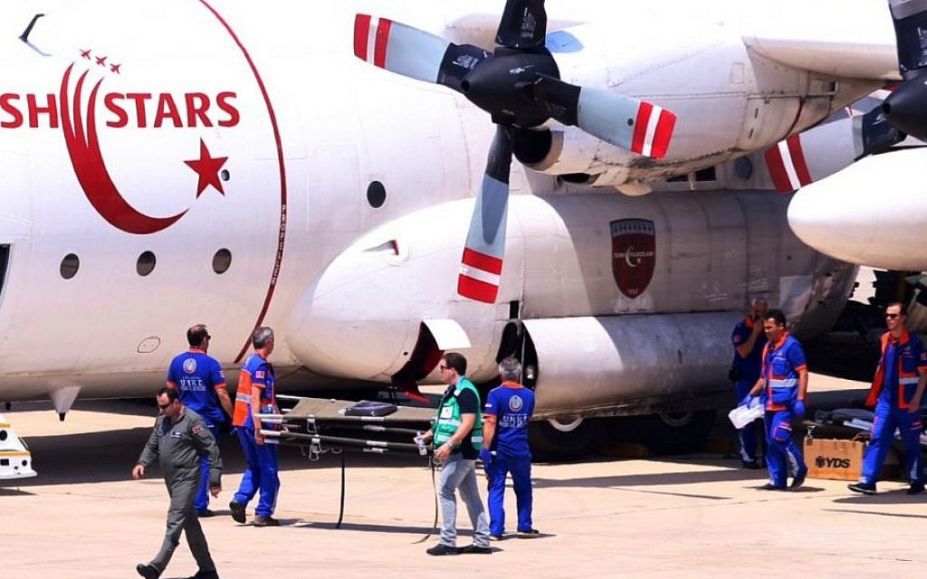 A Turkish Air Force transport plane seen at Ben Gurion International Airport, on August 13, 2014, waiting to fly seventeen Palestinians wounded in the Gaza Strip during Operation Protective Edge to Turkey for medical treatment. The wounded will be taken in Red Crescent ambulances to the Erez border crossing, and then moved to Israeli Magen David Adom ambulances to be taken to Ben Gurion Airport. (Photo credit: Tsahi ben Ami/FLASH90)