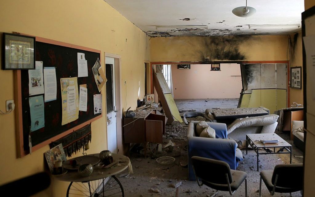 Damage seen in a home hit by a mortar shell in the Eshkol region on August 21, 2014. (Photo credit: Flash90)