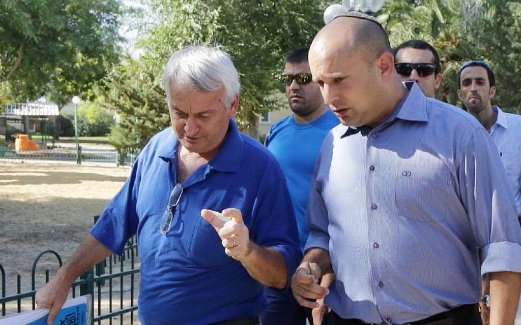 Minister of Education Naftali Bennett (right), pictured with Shaar Hanegev Regional Council head Alon Shuster, at Kibbutz Kfar Aza, near the Israeli-Gaza Border on August 24, 2014. (Photo by Edi Israel/Flash90)