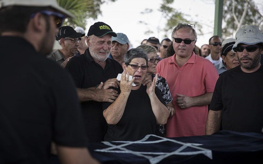 The grandmother of 4-year-old Daniel Tragerman mourns during his funeral at the Hevel Shalom Cemetery in Southern Israel, August 24, 2014 (photo credit: Hadas Parush/Flash90)