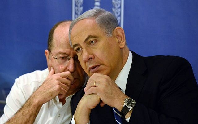 Defense Minister Moshe Ya'alon, left, speaks with Prime Minister Benjamin Netanyahu at the weekly cabinet meeting on August 10, 2014. (photo credit: Haim Zach/GPO/Flash90) Defense Minister Moshe Ya'alon, left, speaks with Prime Minister Benjamin Netanyahu at the weekly cabinet meeting on August 10, 2014. (photo credit: Haim Zach/GPO/Flash90)