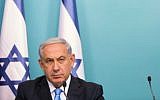 Prime Minister Benjamin Netanyahu speaks at a press conference on Operation Protective Edge at the Prime Minister office in Jerusalem on August 27, 2014. (photo credit: Yonatan Sindel/Flash90)