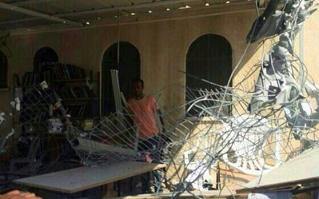 Ashdod synagogue hit by Gaza rocket sustains heavy damage, August 22, 2014. (Photo credit: Israel Police) Ashdod synagogue hit by Gaza rocket sustains heavy damage, August 22, 2014. (Photo credit: Israel Police)