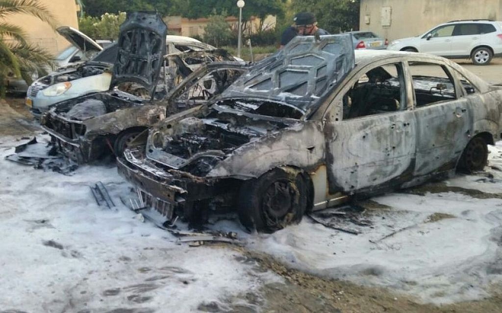 A mortar shell fired from Gaza made a direct hit on a car in a kibbutz in the Sha'ar Hanagev region, killing a four-year-old boy, August 22, 2014. (Photo credit: Israel Police)