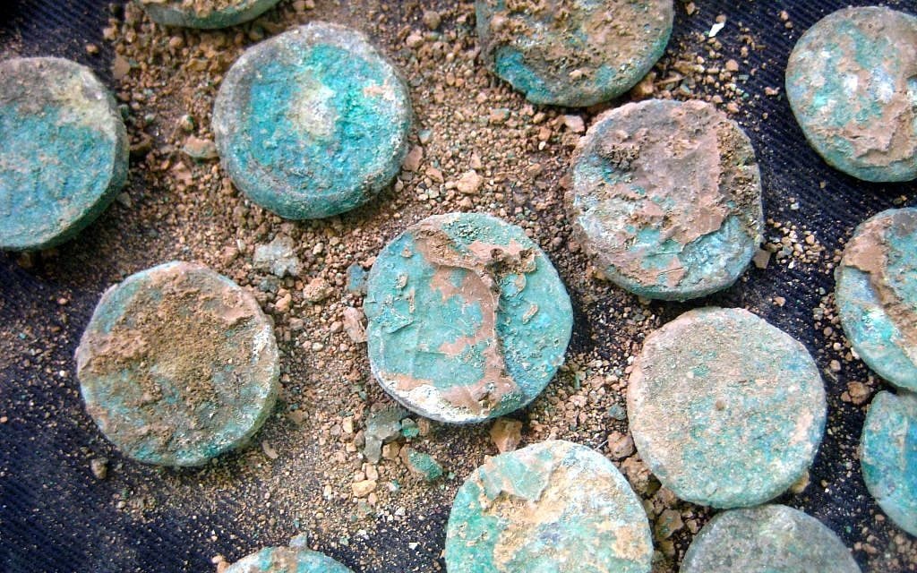 A selection of Jewish Revolt coins found at a Roman-era site outside Jerusalem in 2014. (photo credit: Ilan Ben Zion/Times of Israel staff) A selection of Jewish Revolt coins found at a Roman-era site outside Jerusalem in 2014. (photo credit: Ilan Ben Zion/Times of Israel staff)