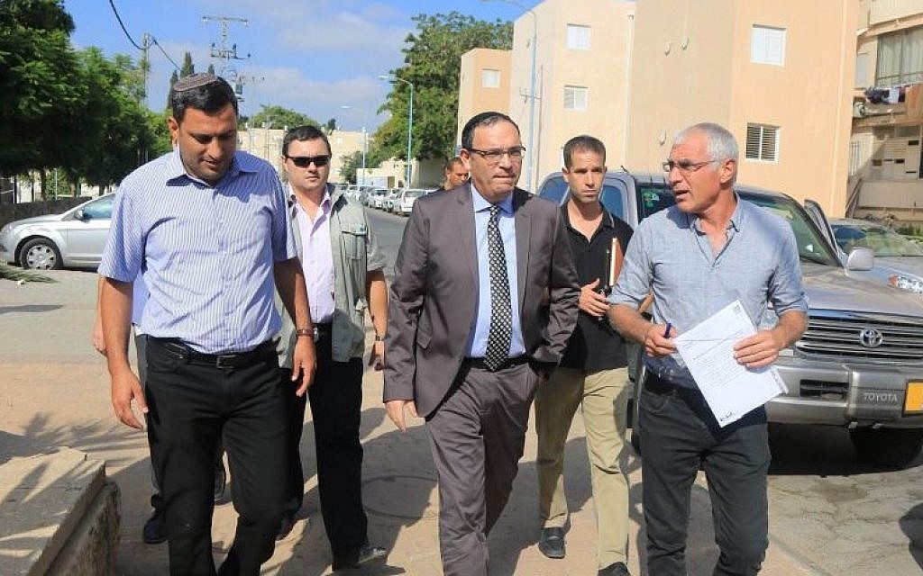 Education Minister Shai Piron (center) with mayors of towns in southern Israel on a tour of school readiness due to the current security situation, on Monday, August 25, 2014. (photo credit: Courtesy Education Ministry)