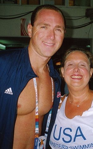 Jane Katz with Olympian Jason Lezak at the 18th Maccabiah Games. (Courtesy)