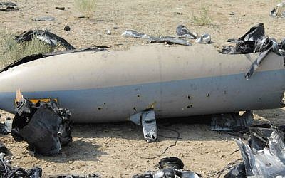 This undated photo released Monday, Aug. 25, 2014 by the Iranian Revolutionary Guards, claims to show the wreckage of an Israeli drone which Iran claims it shot down near an Iranian nuclear site. (photo credit: AP/Sepahnews) This undated photo released Monday, Aug. 25, 2014 by the Iranian Revolutionary Guards, claims to show the wreckage of an Israeli drone which Iran claims it shot down near an Iranian nuclear site. (photo credit: AP/Sepahnews)