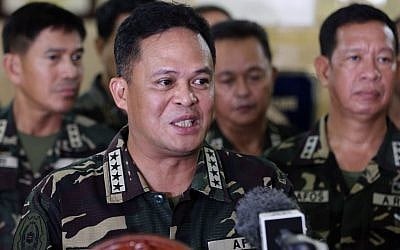 Philippine military chief Gen. Gregorio Pio Catapang answers questions from reporters about the situation of Filipino peacekeepers in the Golan Heights, during a press conference at Camp Aguinaldo military headquarters in suburban Quezon city, Philippines on Sunday August 31, 2014 (photo credit: AP/Aaron Favila)