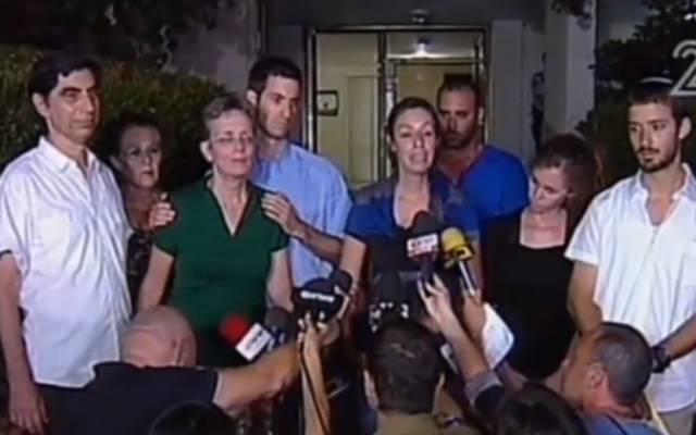 The family of missing soldier Hadar Goldin speaks to the press, August 2 (screen capture: Channel 2)