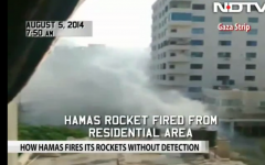 Indian TV crew films Hamas rocket launch from Gaza City residential area, August 5, 2014 (NDTV screenshot)