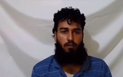 Syrian opposition commander Sharif As-Safouri confesses to collaborating with Israel (photo credit: YouTube screen capture)