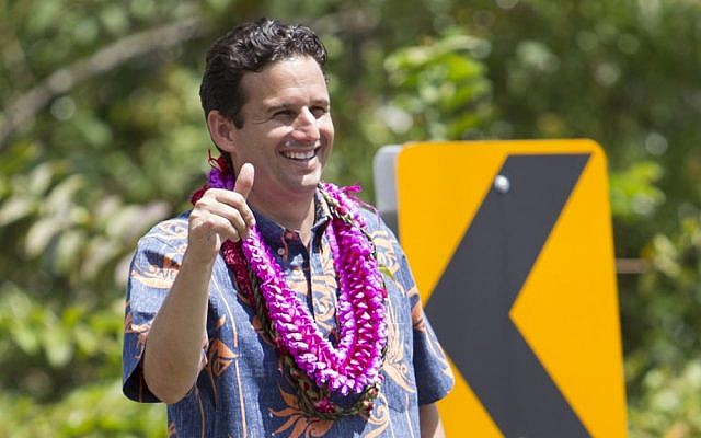 US Sen. Brian Schatz does some last minute campaigning near the polling place, Friday, Aug. 15, 2014 in Pahoa, Hawaii. (Photo credit: AP/Marco Garcia) US Sen. Brian Schatz does some last minute campaigning near the polling place, Friday, Aug. 15, 2014 in Pahoa, Hawaii. (Photo credit: AP/Marco Garcia)