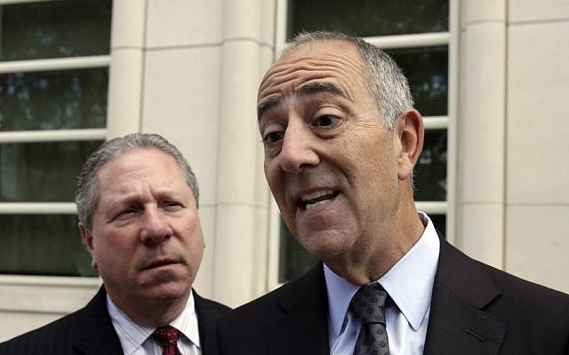 Mark Werbner, right, an attorney for the plaintiffs in a case against Jordan-based Arab Bank, talks with reporters outside the federal court in the Brooklyn borough of New York, Thursday, August 14, 2014. (photo credit: AP/Richard Drew)