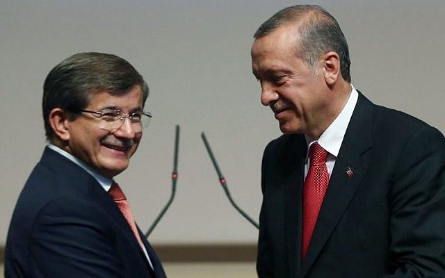 Turkey's president-elect Recep Tayyip Erdogan, right, greets Foreign Minister Ahmet Davutoglu after he announced Davutoglu as his ruling Justice and Development Party's new leader, in Ankara, Turkey, on Thursday, August 21, 2014. (AP Photo/Burhan Ozbilici) Turkey's president-elect Recep Tayyip Erdogan, right, greets Foreign Minister Ahmet Davutoglu after he announced Davutoglu as his ruling Justice and Development Party's new leader, in Ankara, Turkey, on Thursday, August 21, 2014. (AP Photo/Burhan Ozbilici)