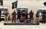 Members of Ansar Bayt al-Maqdis in the Egyptian Sinai read out sentences before they behead four men accused of spying for Israel, August 2014 (screen capture: YouTube)