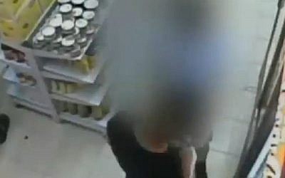 Two of the suspects in the murder of Muhammed Abu Khdeir seen at a supermarket before the attack (Photo credit: Channel 2 screen capture)
