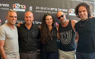 Ashkelon mayor Itamar Shimoni (second from left) and performers who will be onstage at the city's Briza Festival during the last week of August (photo credit: Sigal Eiland)