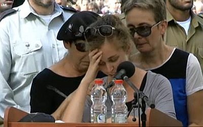 Edna Sarusi speaking at the funeral of her fiance Hadar Goldin on Sunday, August 3, 2014. (Screen capture: Ynet) 