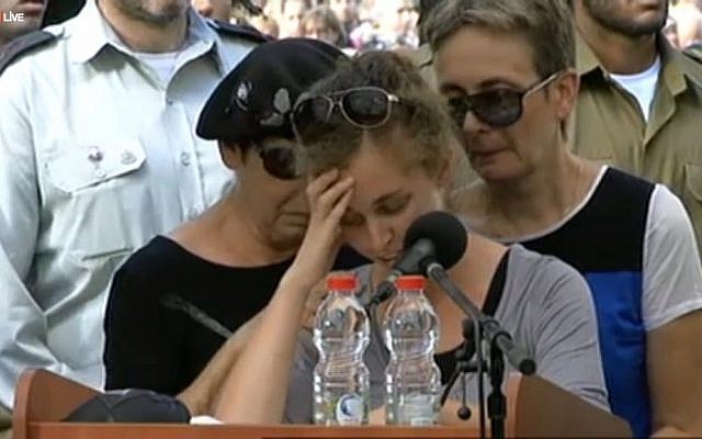 Edna Sarusi speaking at the funeral of her fiance Hadar Goldin on Sunday, August 3, 2014. (Screen capture: Ynet) 