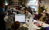 The newsroom of Army Radio, which contains both conscripted soldiers and civilians who work on its programming. (Tomer Neuberg/Flash 90/File)