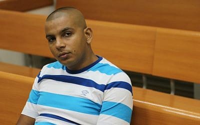 Israeli-Arab Mahmoud Mansour in the Rishon Lezion Magistrate's Court petitioning against a protest against his wedding to a Jewish woman, on August 17, 2014.  (photo credit: FLASH90)