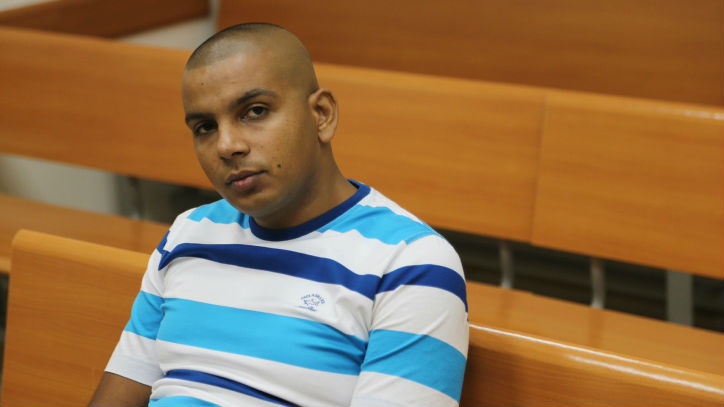 Arab Israel Mahmoud Mansour in Rishon Lezion Magistrate's Court petitioning against a protest against his wedding to a Jewish woman, on August 17, 2014. (photo credit: FLASH90) Arab Israel Mahmoud Mansour in Rishon Lezion Magistrate's Court petitioning against a protest against his wedding to a Jewish woman, on August 17, 2014. (photo credit: FLASH90)