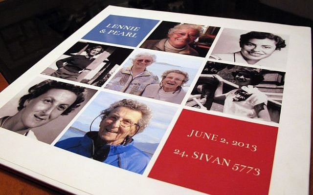 In this Friday, Aug. 1, 2014 photo, a personalized picture book sits on the dining room table in Lennie Gerber and Pearl Berlin's home in High Point, N.C. The couple were married in Maine last year, but they want their home state to legally recognize their love. (AP Photo/Allen G. Breed)