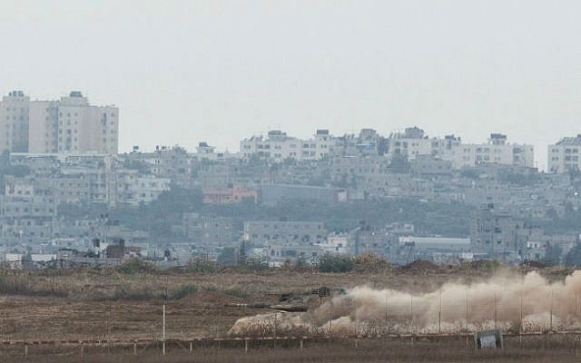 An Israeli tank holding a position inside the southern Gaza Strip on August 2, 2014 (photo credit: Yonatan Sindel/Flash90) 