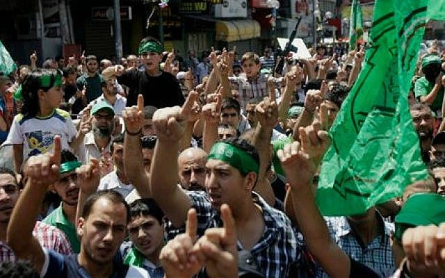 Hamas supporters at a demonstration in the West Bank city of Nablus on Friday, Aug. 15, 2014 (photo credit: AP Photo/Nasser Ishtayeh) Hamas supporters at a demonstration in the West Bank city of Nablus on Friday, Aug. 15, 2014 (photo credit: AP Photo/Nasser Ishtayeh)