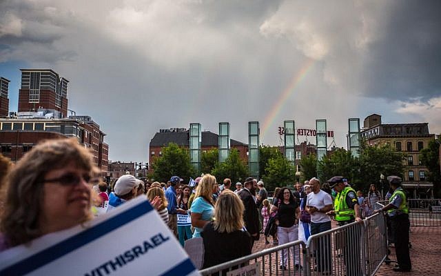 Just as the Rally for Israel in Boston ended August 7, a double rainbow appeared over the New England Holocaust Memorial's six glass towers (photo credit: Elan Kawesch/The Times of Israel)