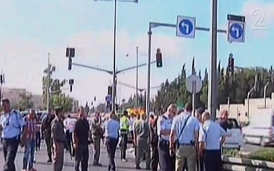 Police at the scene of a shooting near Wadi al-Joz and Mount Scopus in Jerusalem, on Monday, August 4, 2014. (photo credit: Screen capture Channel 2)