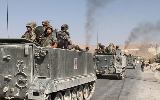 Lebanese troops deploy in the eastern town of Arsal near the Syrian border on August 28, 2014. (AFP/STR/file) Lebanese troops deploy in the eastern town of Arsal near the Syrian border on August 28, 2014. (AFP/STR/file)