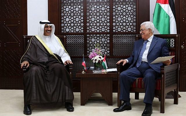 Palestinian Authority President Mahmoud Abbas, right, meets with Kuwaiti Foreign Minister Sheikh Sabah al-Khaled al-Sabah on September 14, 2014 in Ramallah. (photo credit: AFP/ABBAS MOMANI) Palestinian Authority President Mahmoud Abbas, right, meets with Kuwaiti Foreign Minister Sheikh Sabah al-Khaled al-Sabah on September 14, 2014 in Ramallah. (photo credit: AFP/ABBAS MOMANI)