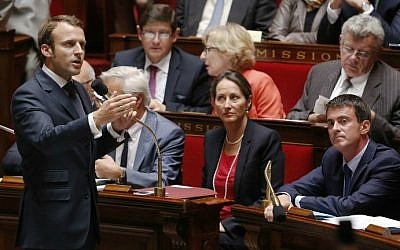 French Minister Emmanuel Macron, speaks during the weekly session of questions to the government at the National Assembly in Paris on September 17, 2014. (photo credit: Thomas Samson/AFP)