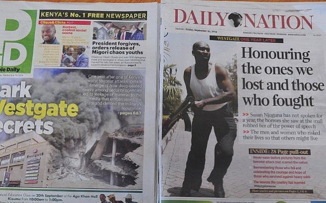 Kenyan newspapers with headlines related to the Westgate mall terror attack are pictured on September 19, 2014 as Kenya commemorates the first anniversary since the terror attack that happened in the Nairobi's shopping mall. (photo credit: AFP Photo/Simon Maina) Kenyan newspapers with headlines related to the Westgate mall terror attack are pictured on September 19, 2014 as Kenya commemorates the first anniversary since the terror attack that happened in the Nairobi's shopping mall. (photo credit: AFP Photo/Simon Maina)