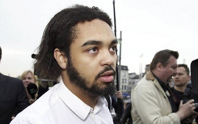 Belgian citizen Jejoen Bontinck, (C), followed by his lawyer Kris Luyckx, arrives for the first day of the trial of radical Islamic group "Sharia4Belgium" at the courthouse of Antwerp on September 29, 2014. (photo credit: AFP/BELGA PHOTO / NICOLAS MAETERLINCK) Belgian citizen Jejoen Bontinck, (C), followed by his lawyer Kris Luyckx, arrives for the first day of the trial of radical Islamic group "Sharia4Belgium" at the courthouse of Antwerp on September 29, 2014. (photo credit: AFP/BELGA PHOTO / NICOLAS MAETERLINCK)
