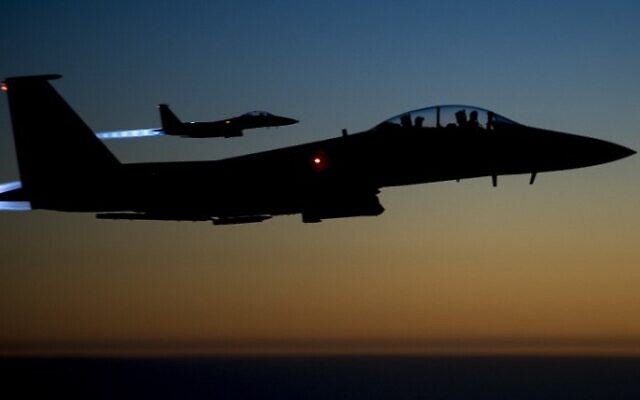 A pair of US Air Force F-15E Strike Eagles flying over northern Iraq early in the morning of September 23, 2014 after conducting airstrikes in Syria (Photo credit: AFP / US Air Forces Central Command via DVIDS / Senior Airman Matthew Bruch) A pair of US Air Force F-15E Strike Eagles flying over northern Iraq early in the morning of September 23, 2014 after conducting airstrikes in Syria (Photo credit: AFP / US Air Forces Central Command via DVIDS / Senior Airman Matthew Bruch)